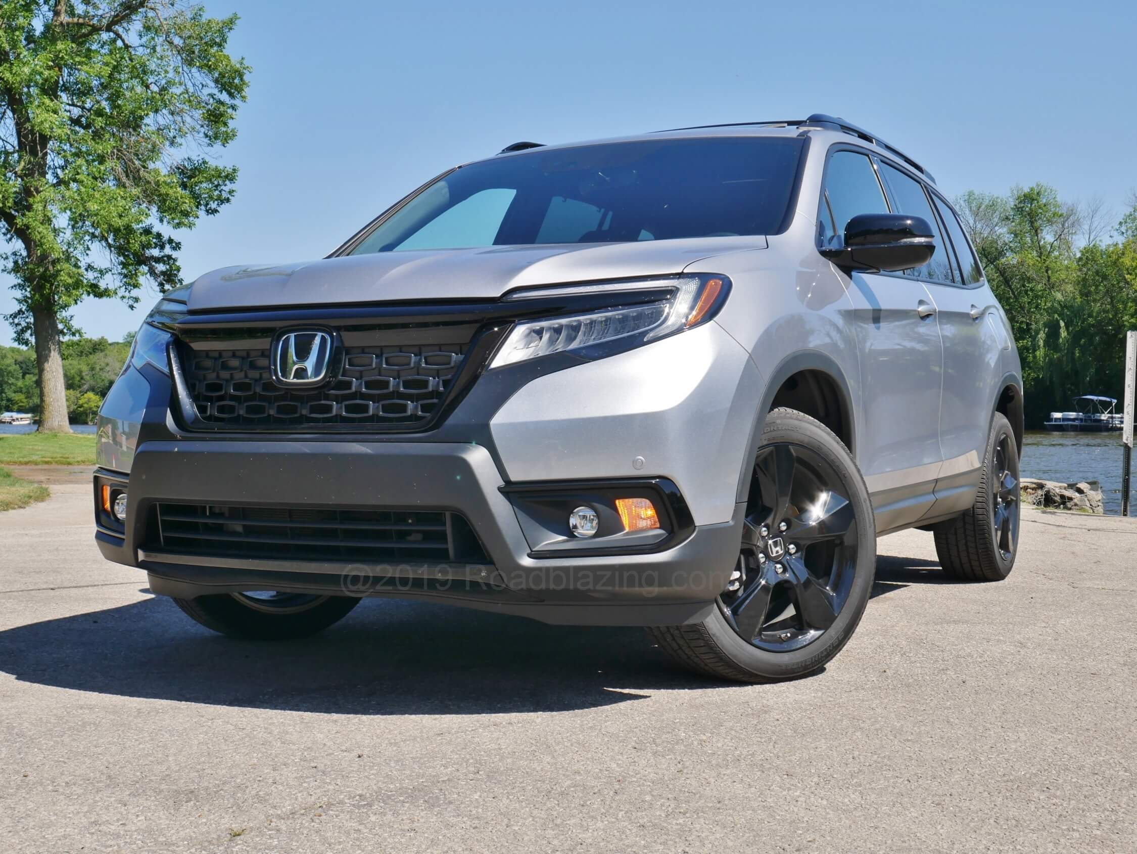 2019 Honda Passport Elite AWD: Rugged-ized lower body cladding from the ground up