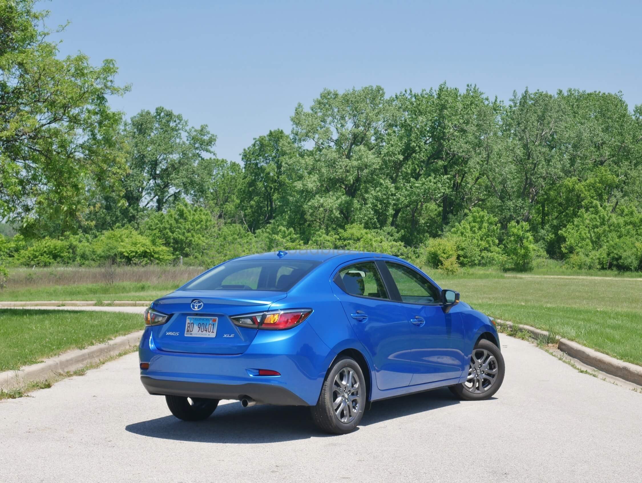 2019 Toyota Yaris sedan XLE: Sapphire blue matches the caressing 4-door coupe silhouette