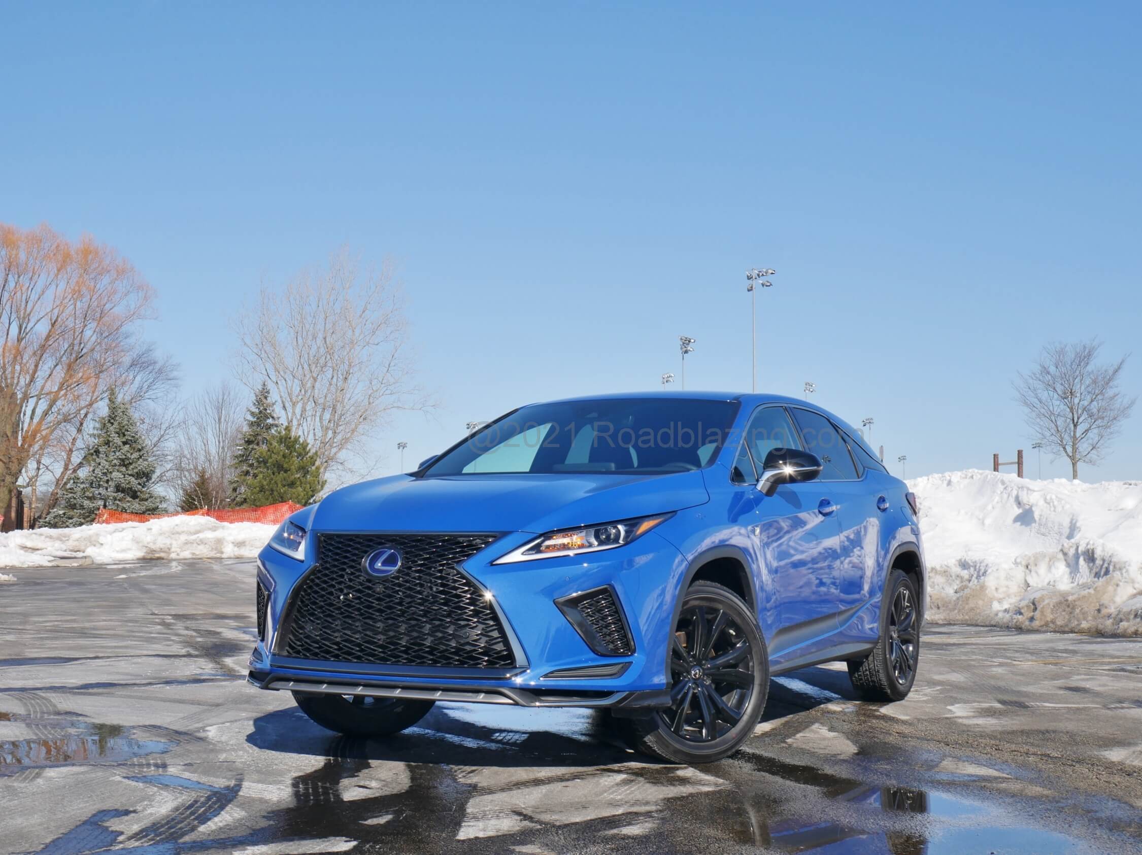 2021 Lexus 450h Hybrid AWD F-Sport: Sports the polarizing dark honeycomb filled spindle snout