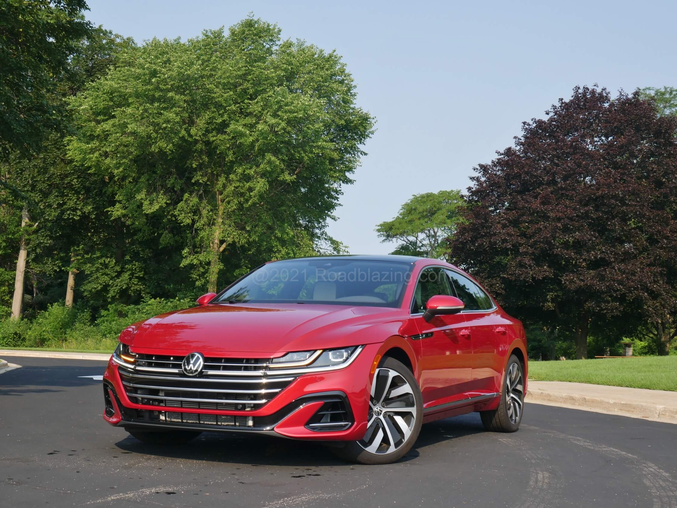 2021 Volkswagen Arteon 2.0T SEL R-Line 4Motion: white LED grille light bars connect headlamp DRLs on R-Line