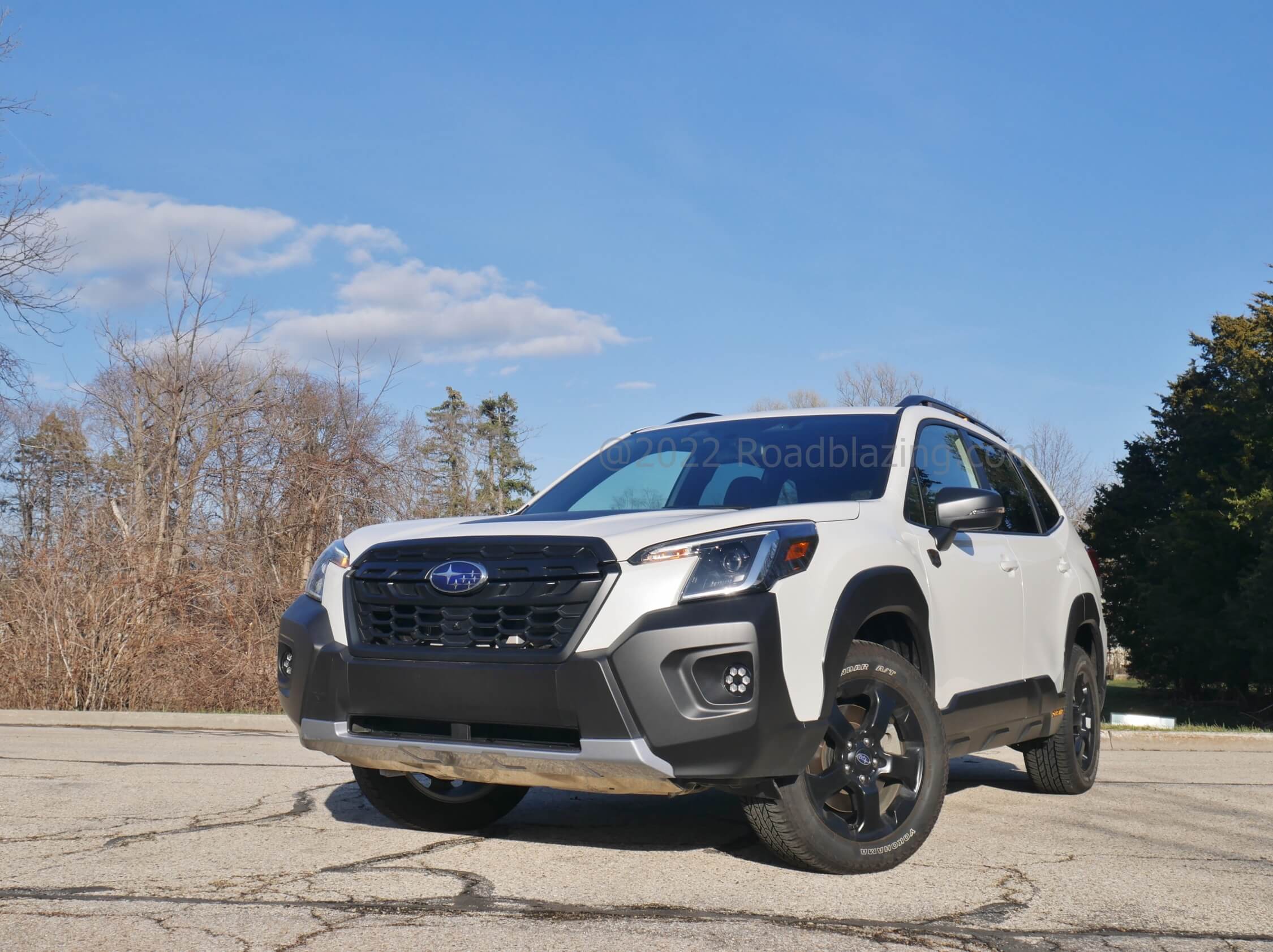 2022 Subaru Forester 2.5L Wilderness AWD: goes to town on aggressive dark body cladding, adds lower front bash plate, includes distinctive multi-segmented driving lights